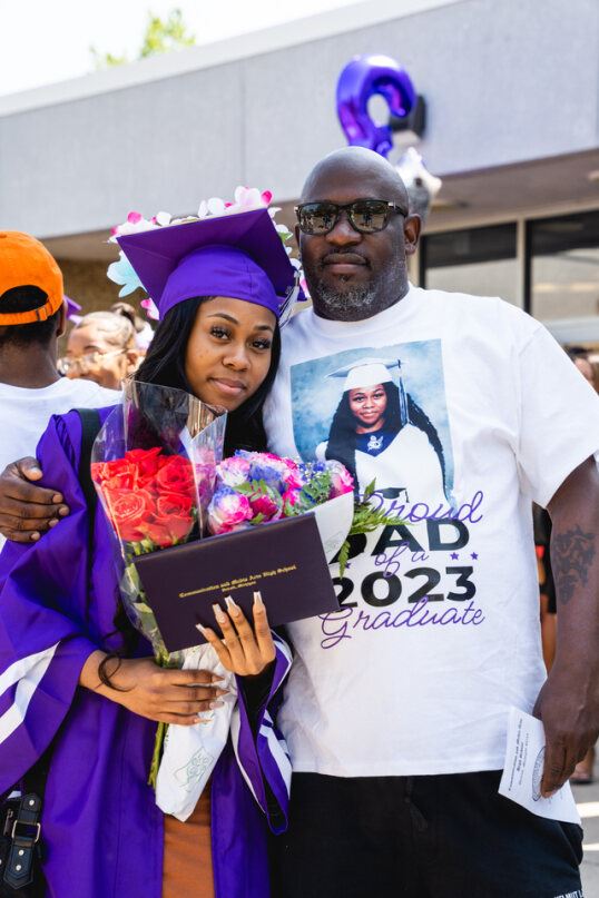  Student at graduation with parent
